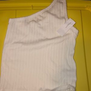 One shoulder white top